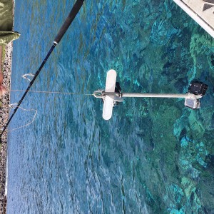 Survey equipment used for marine habitat ground-truthing, including a Go Pro hero 9 camera, an LED light array and an electric fishing rod